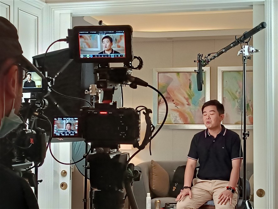 Qingdao production crew coordinating a local shoot